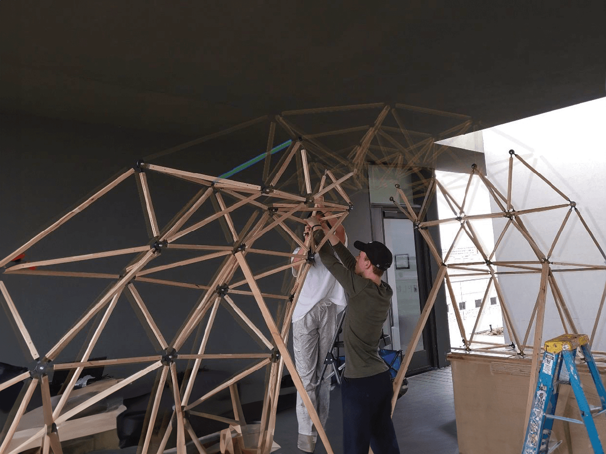 Students assemble spaceframe using holographic guide