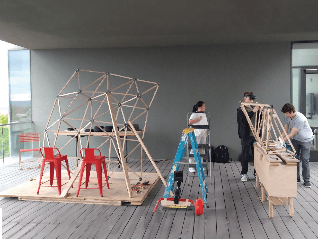 Students assemble spaceframe using holographic guide