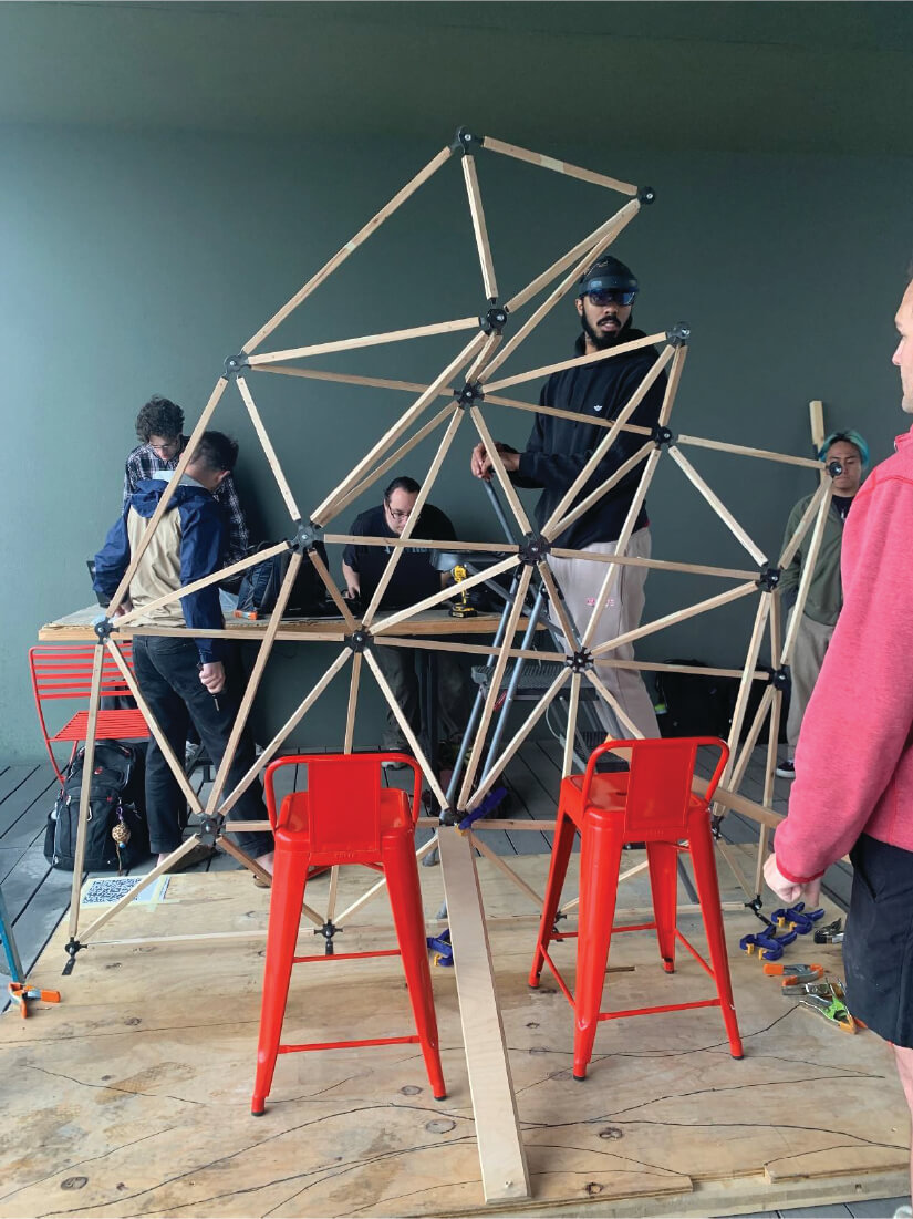 Students assemble spaceframe using holographic guide